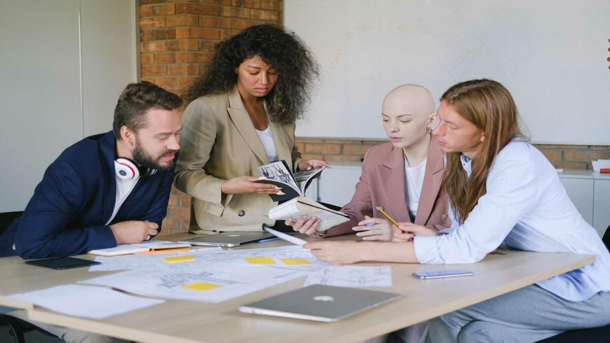 Manager talking to employees