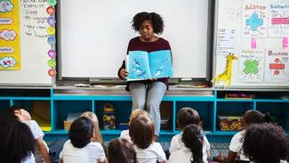 A teacher in a classroom.