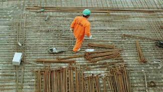 Construction worker on empty worksite