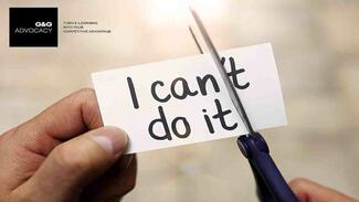 someone doing an online course cutting a page saying I can't do it