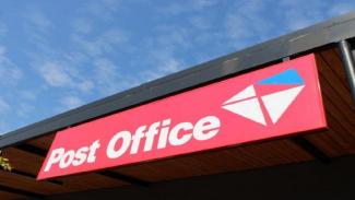 People collecting R350 grant at post office