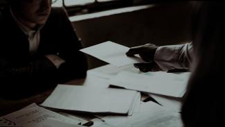 dismissal of an employee who accused a fellow employee of racism and threatened and intimidated her